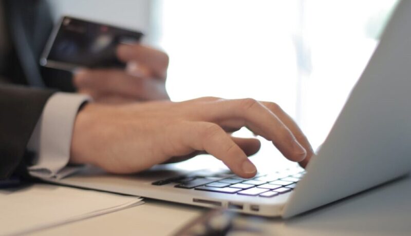 Man writing on keyboard